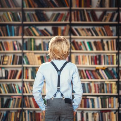 Education Little pupil in library